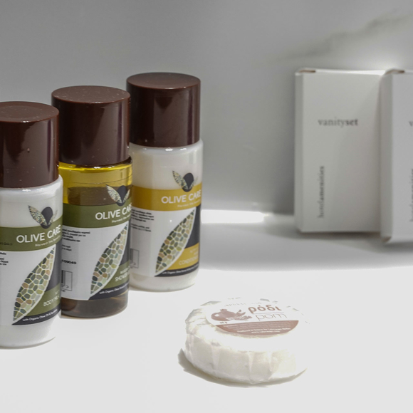 Bathroom amenities set including olive oil products, soap and vanity kits